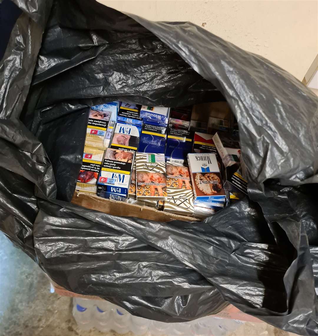 Illegal cigarettes discovered during a raid at Nasz Market, Spalding. Photo: Lincolnshire Trading Standards