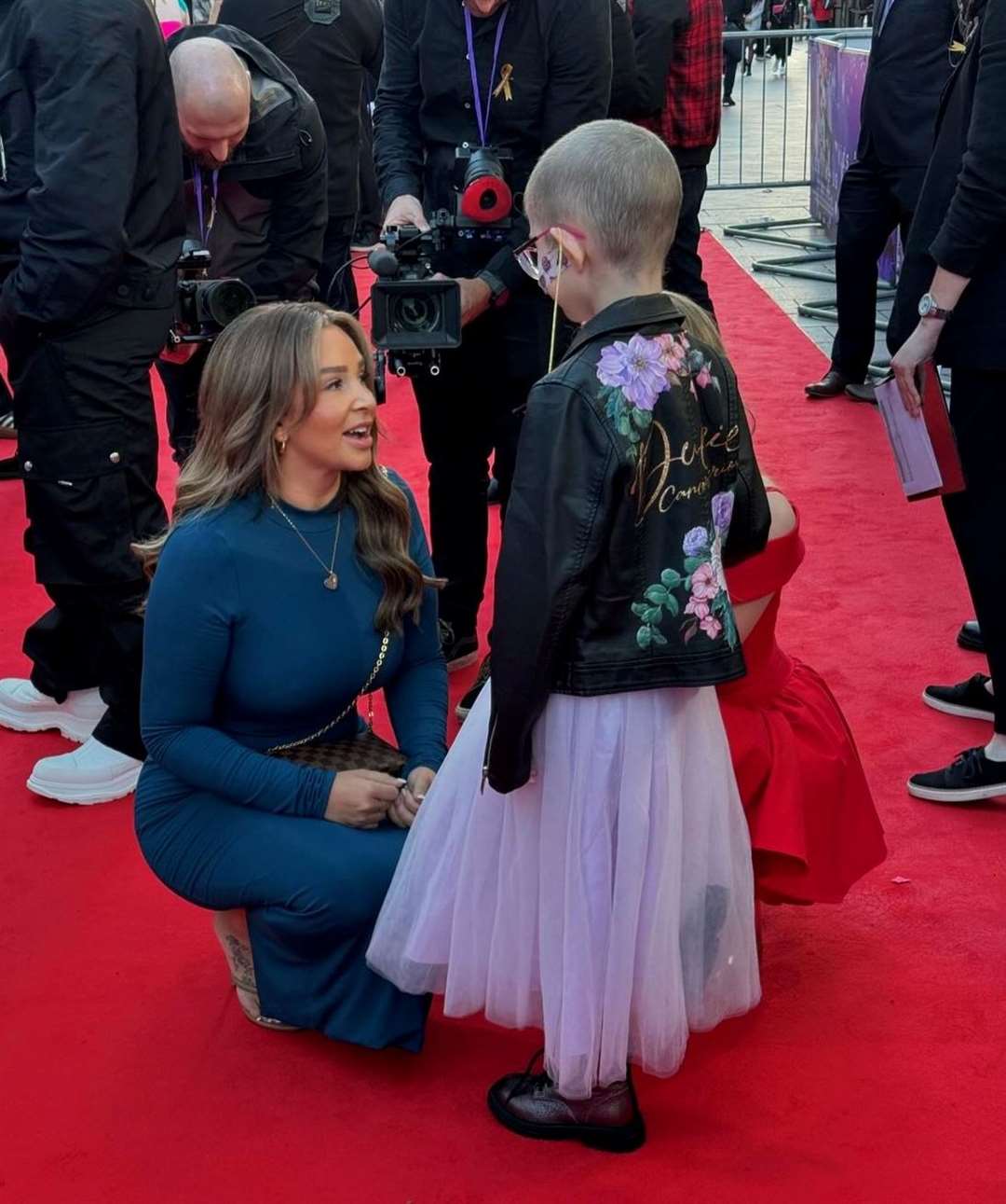 Duclie O'Kelly, 8, walking the red carpet