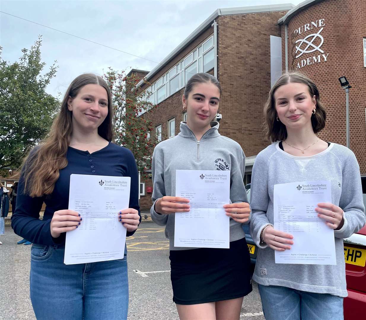 Pupils at Bourne Academy celebrate their GCSE results. Pictured are Isla Millar, Ella Frisby and Grace Wareham