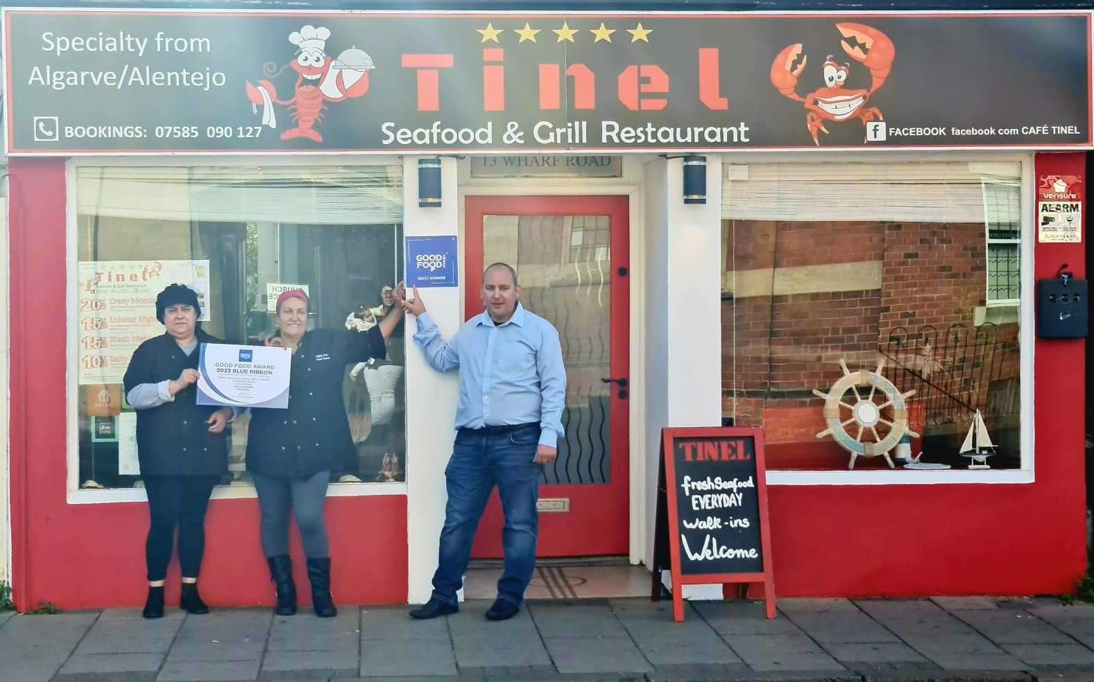 Staff outside the Tinel Seafood and Grill Restaurant with their award. (59918155)