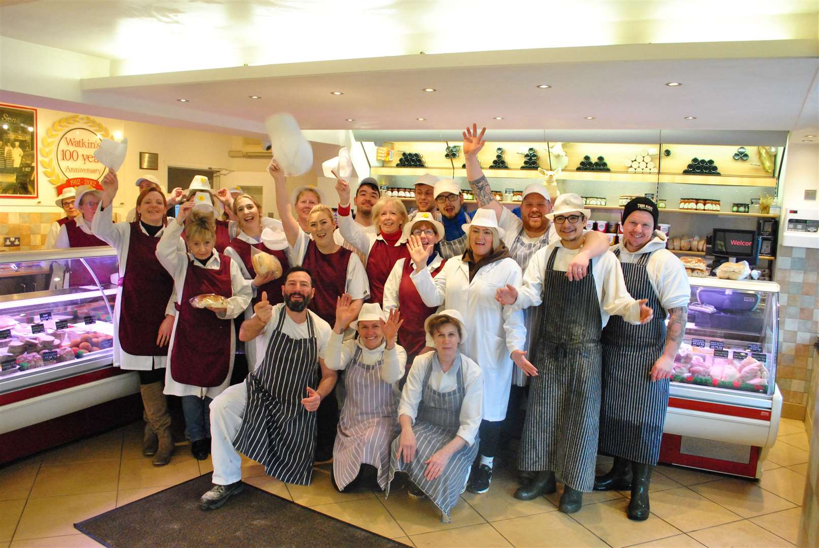 Watkin's staff celebrate as they take over control of the popular Grantham business, (63079123)