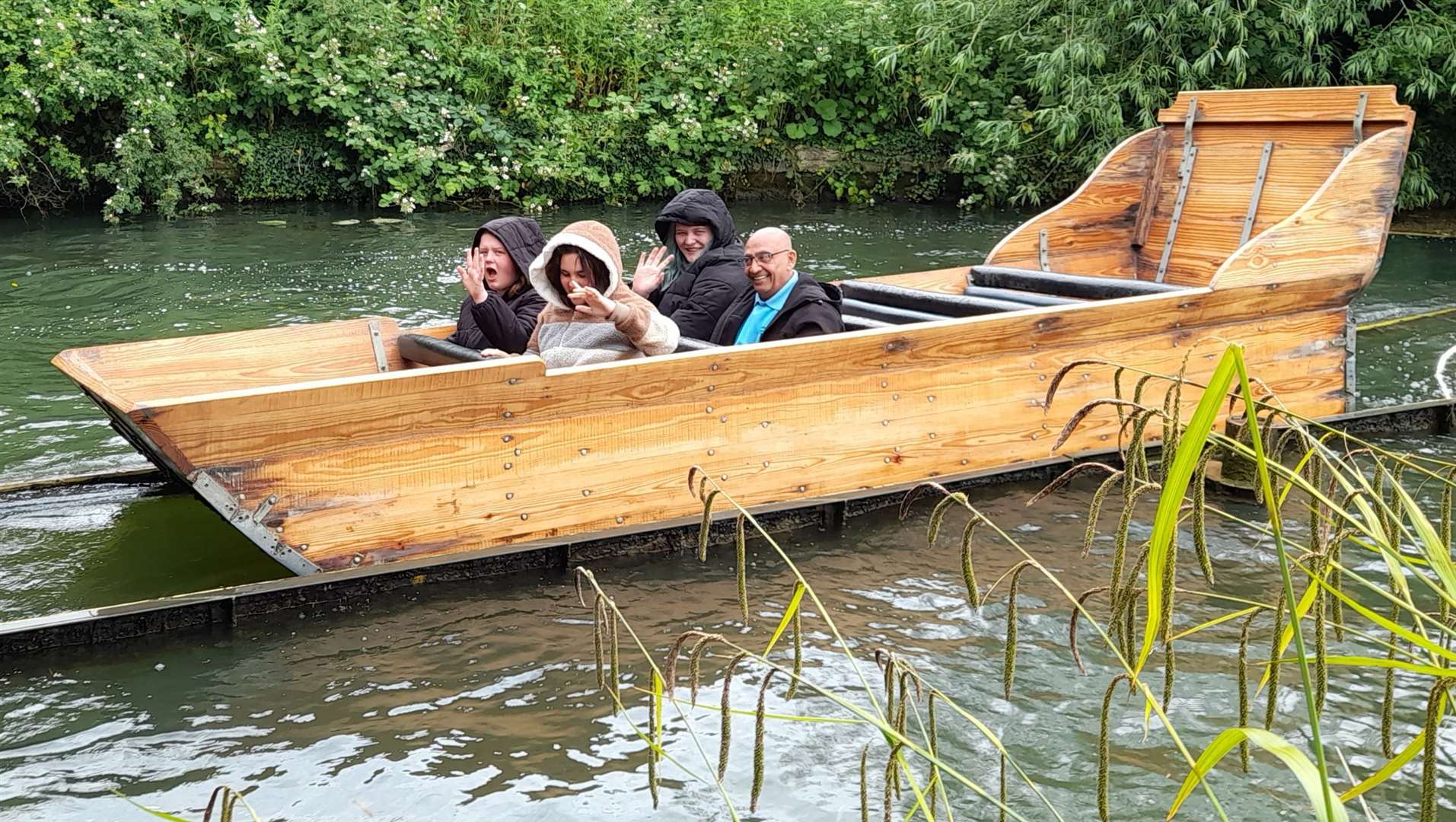 Grantham Sunrise Rotary Club members joining in the fun with local pupils on the water.