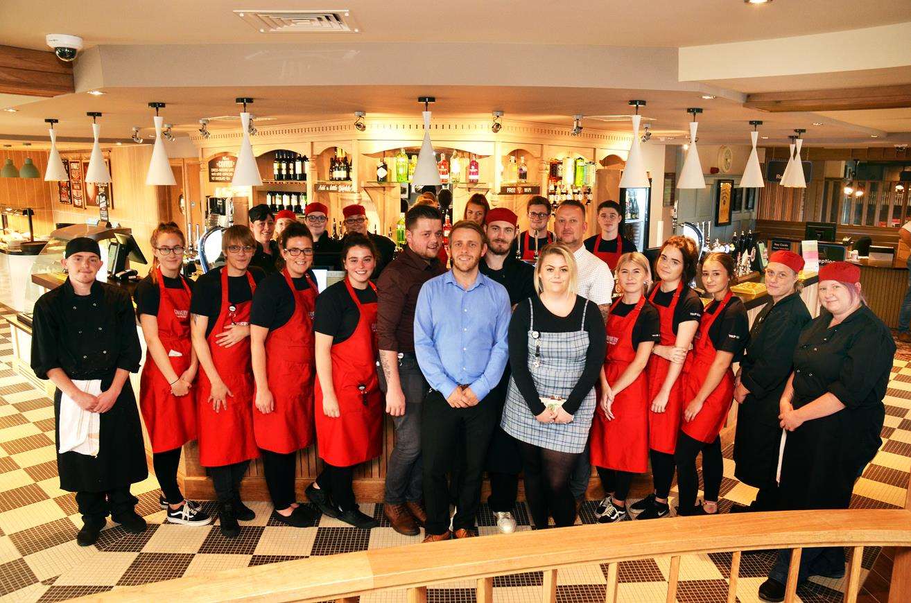 General manager Gary Stevenson, deputy manager Jamie Baxter and staff at The Tulip Queen, Spalding. Photo (TIM WILSON): SG-210918-012TW