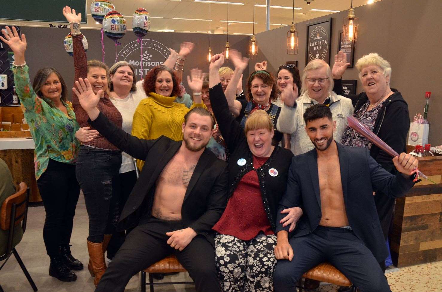 Sally Sharman-Gray and her pals with 'hunks in trunks' Luke and Jake at Morrisons.