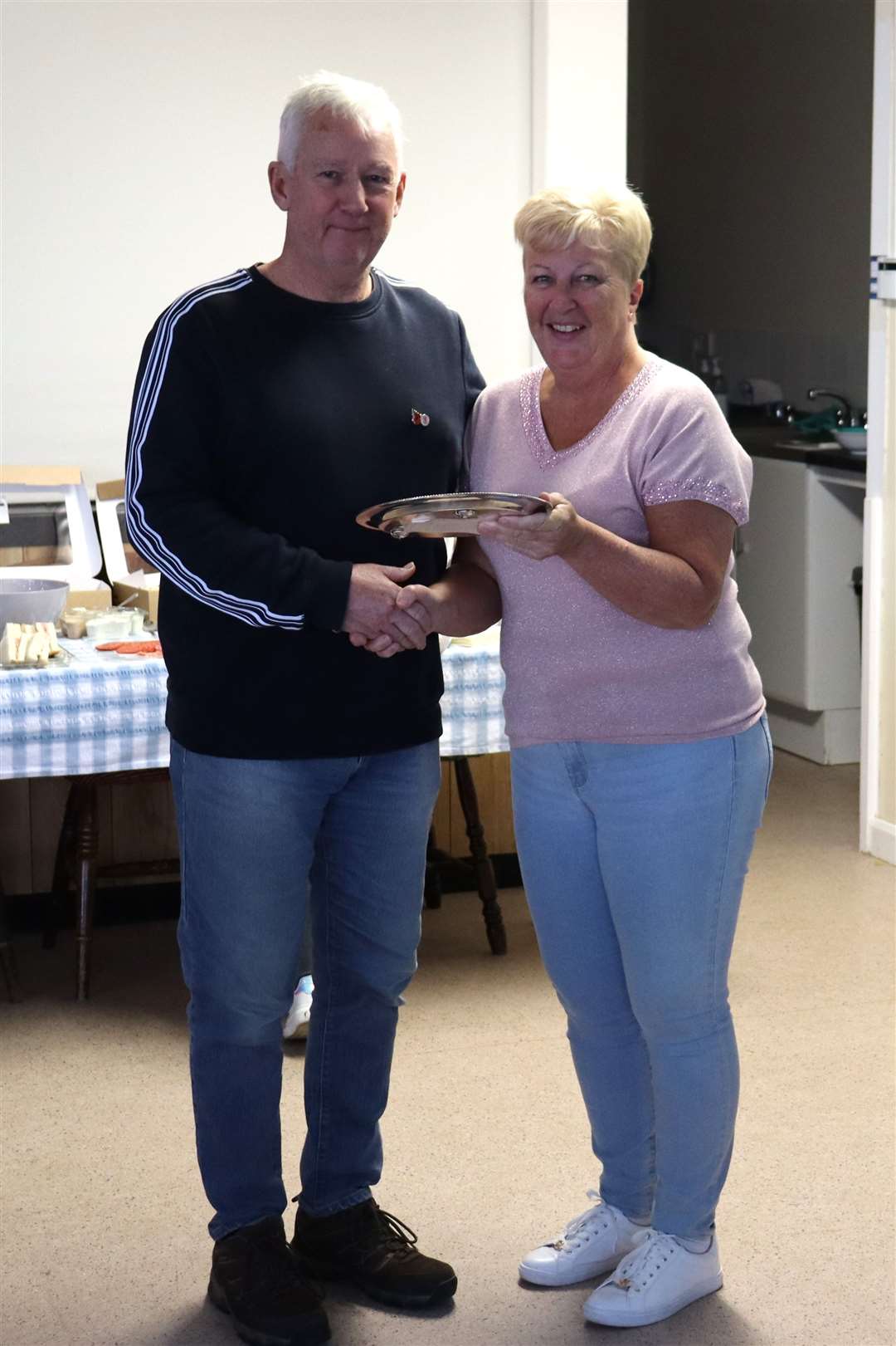 Alan Chapman, winner of the Herd Salva, Ditch Crawler Trophy and Anne Smith Persaverance Trophy, is pictured with Commodore Sarah Prior.