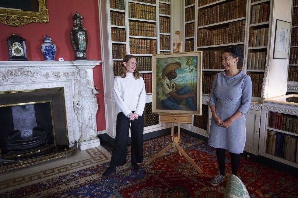 Assistant national curator Alice Rylance-Watson and cultural heritage curator Charlotte Holmes with Richmond Barthé's portrait at Belton House. Photo: National Trust/Arnhel de Serra (59831384)