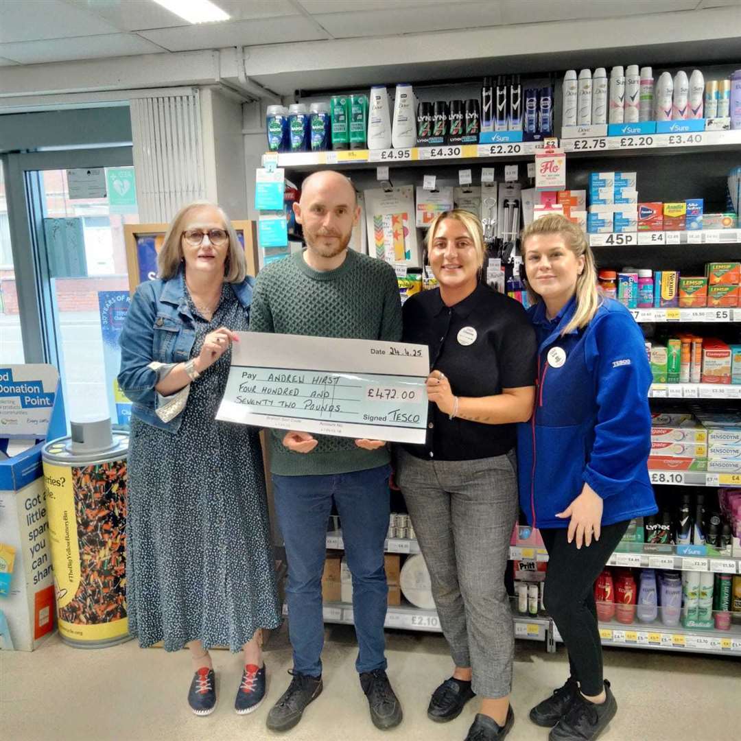 Andrew Hirst with staff at Tesco Balderton