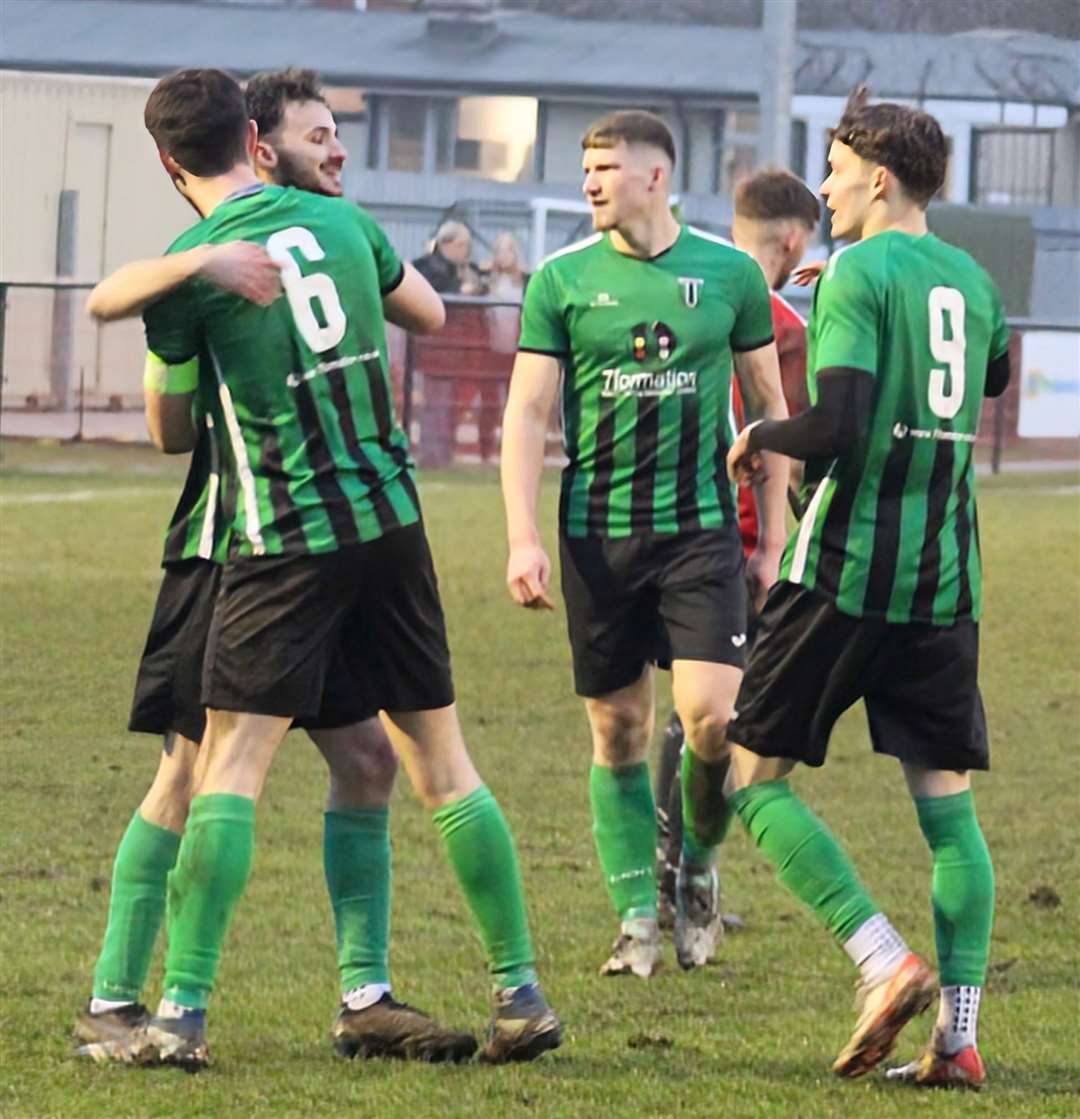 Alfie Ferguson is congratulated after making it six. Photo: Darren Wiggins