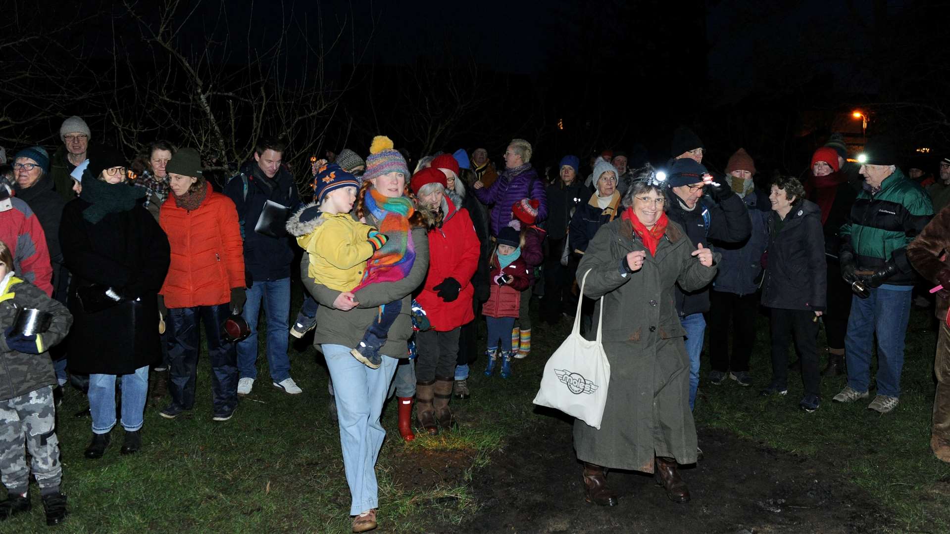 People gathered in the community orchard. Photo: Chris Lowndes