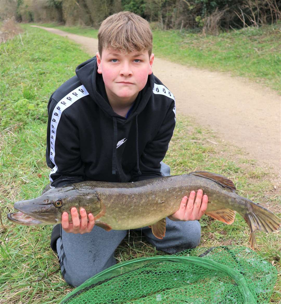 Fourteen-year-old Oliver Toon with his surprise monster pike caught from the Grantham Canal. (62534673)
