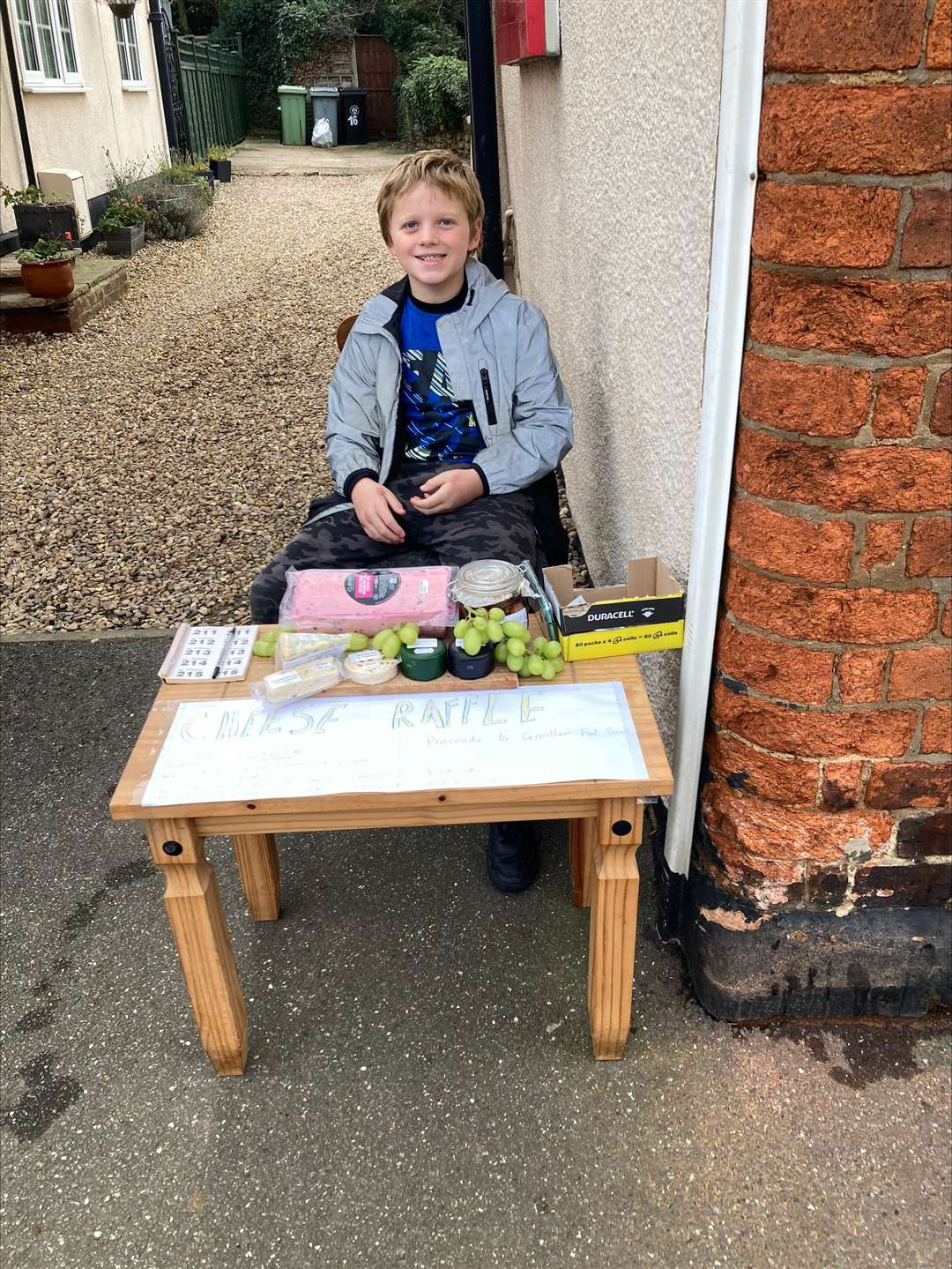 David Martin, 10, sells cheese raffle tickets outside the Great Gonerby Post Office once a month to raise money for Grantham Foodbank. (63483668)
