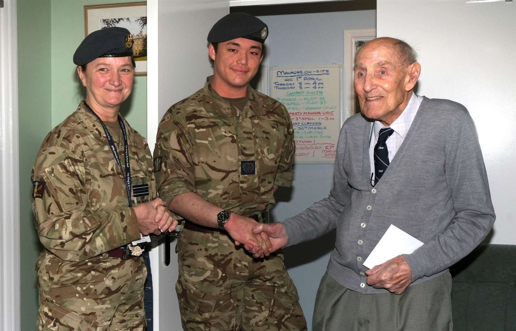 Terry with the two cadets from Grantham King's School. Photo: Supplied