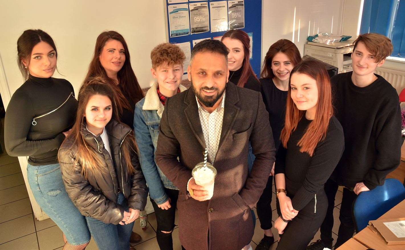 Mroof Choudry with staff who will be working in his new restaurant.