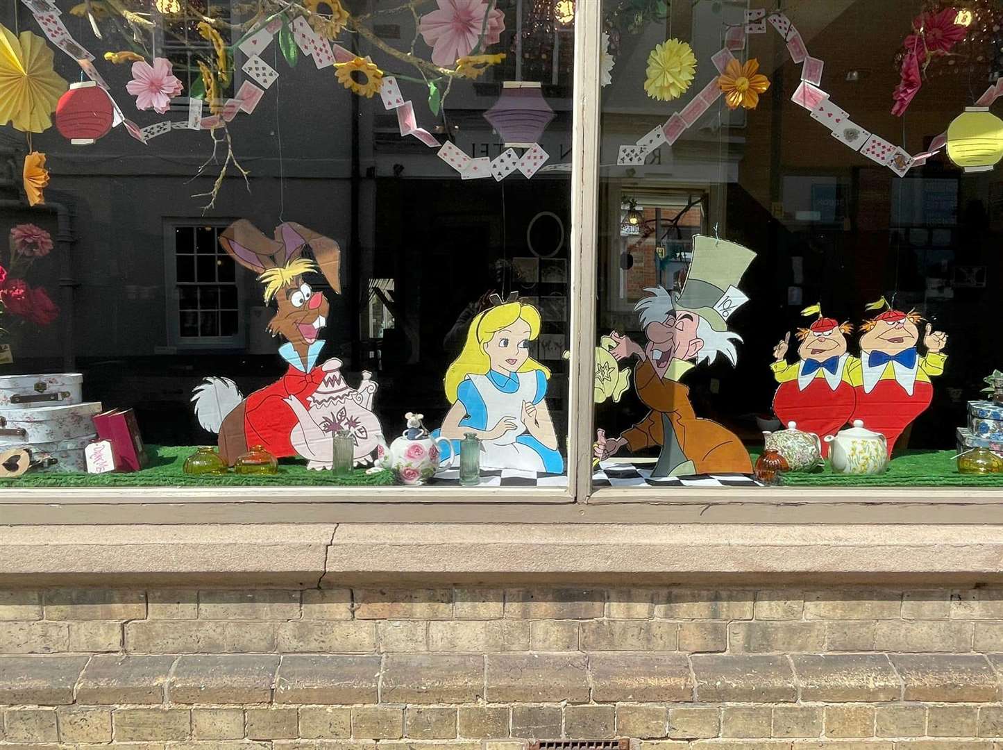 Penningtons delighted passers by with their Alice In Wonderland display