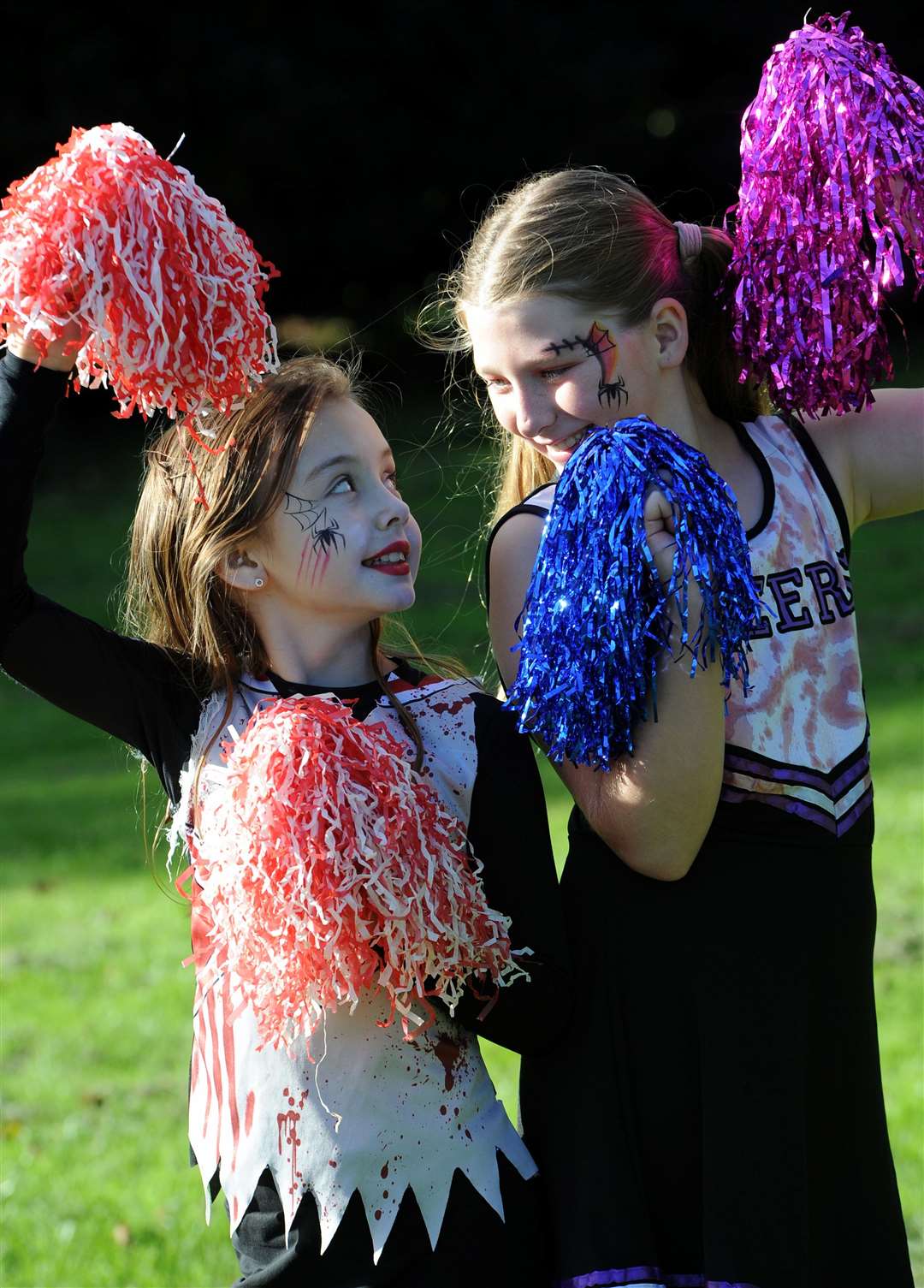 Spooky cheerleaders Chea Swanborough, 10, and Violet Adams, 11. Photo: Chris Lowndes