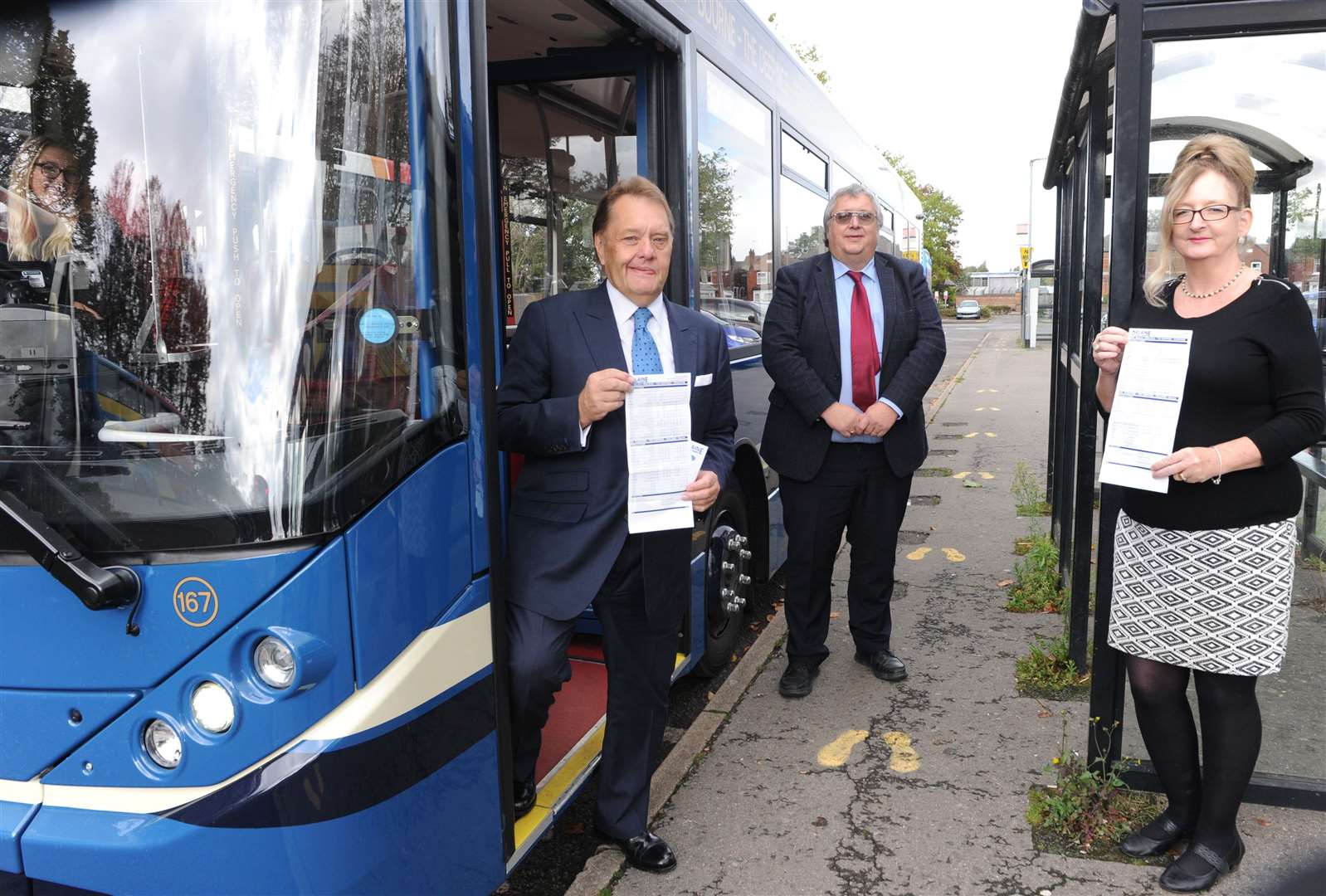 Sir John Hayes, Anthony Delaine-Smith and Coun Louise McGuinness with the new 301/302 bus timetable for Spalding, the Deepings and Stamford. Photo by Chris Lowndes. (42622608)