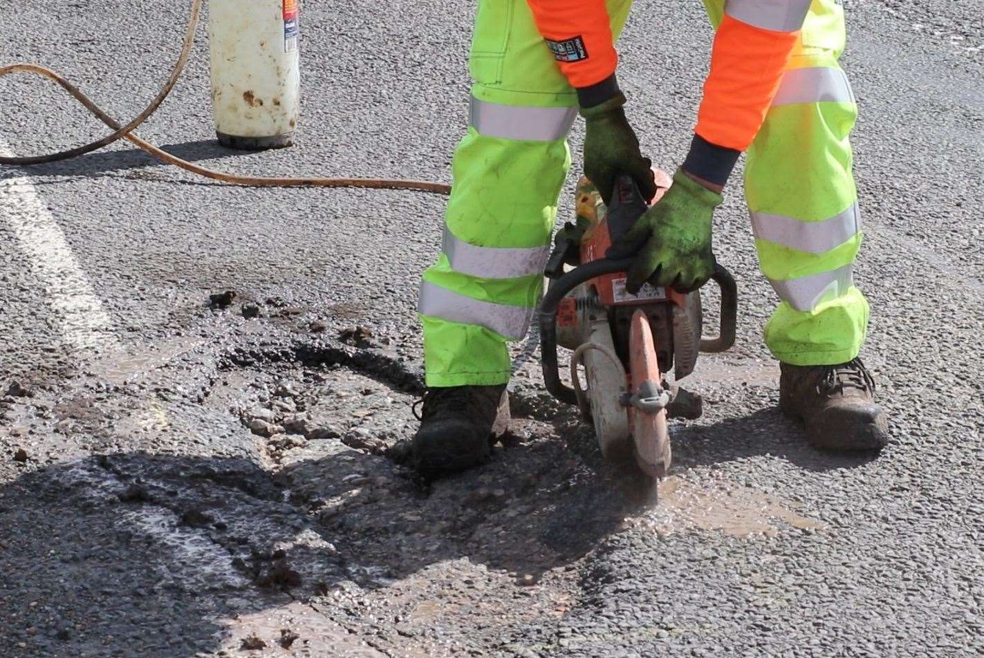 Staff working diligently on road repairs, part of Lincolnshire’s major roadworks initiative. Photo: LCC