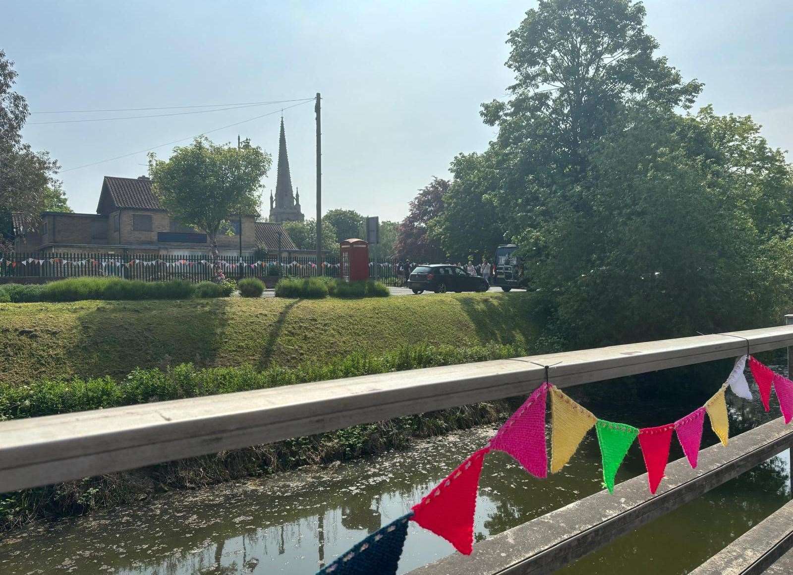 The knitted bunting was a nice addition to the side of the River Welland for Spading Flower Parade. Photo: Lorna O'Dwyer