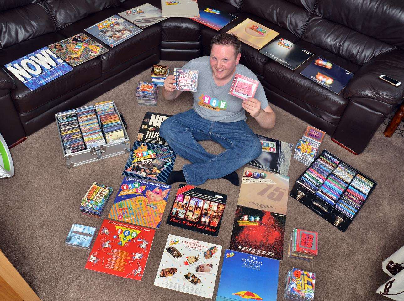 Darren Long with a few albums from his massive collection. Photo (TIM WILSON): 200718SG-2