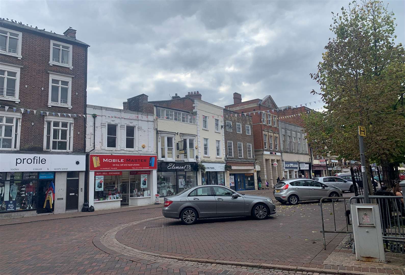 Cars parked in Market Place, Spalding - ignoring the TRO rules