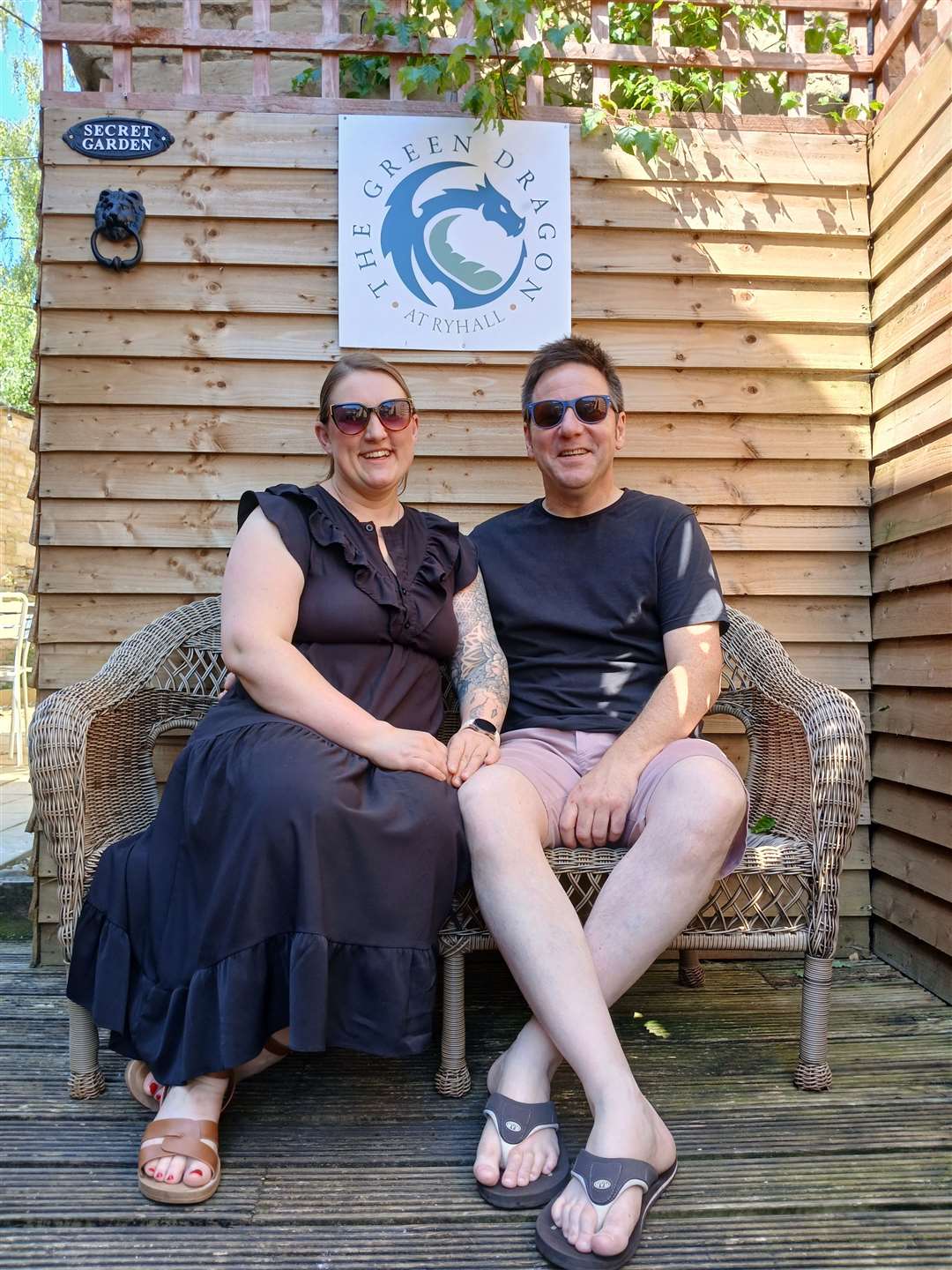 Ania and Simon Lambert relax in the courtyard outside The Green Dragon