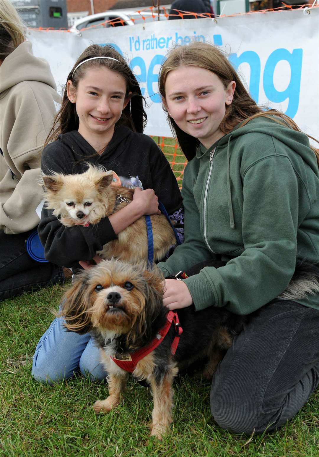 Bella Fisher Cox 11 and Eve Fisher 16 with Rosie and Benji