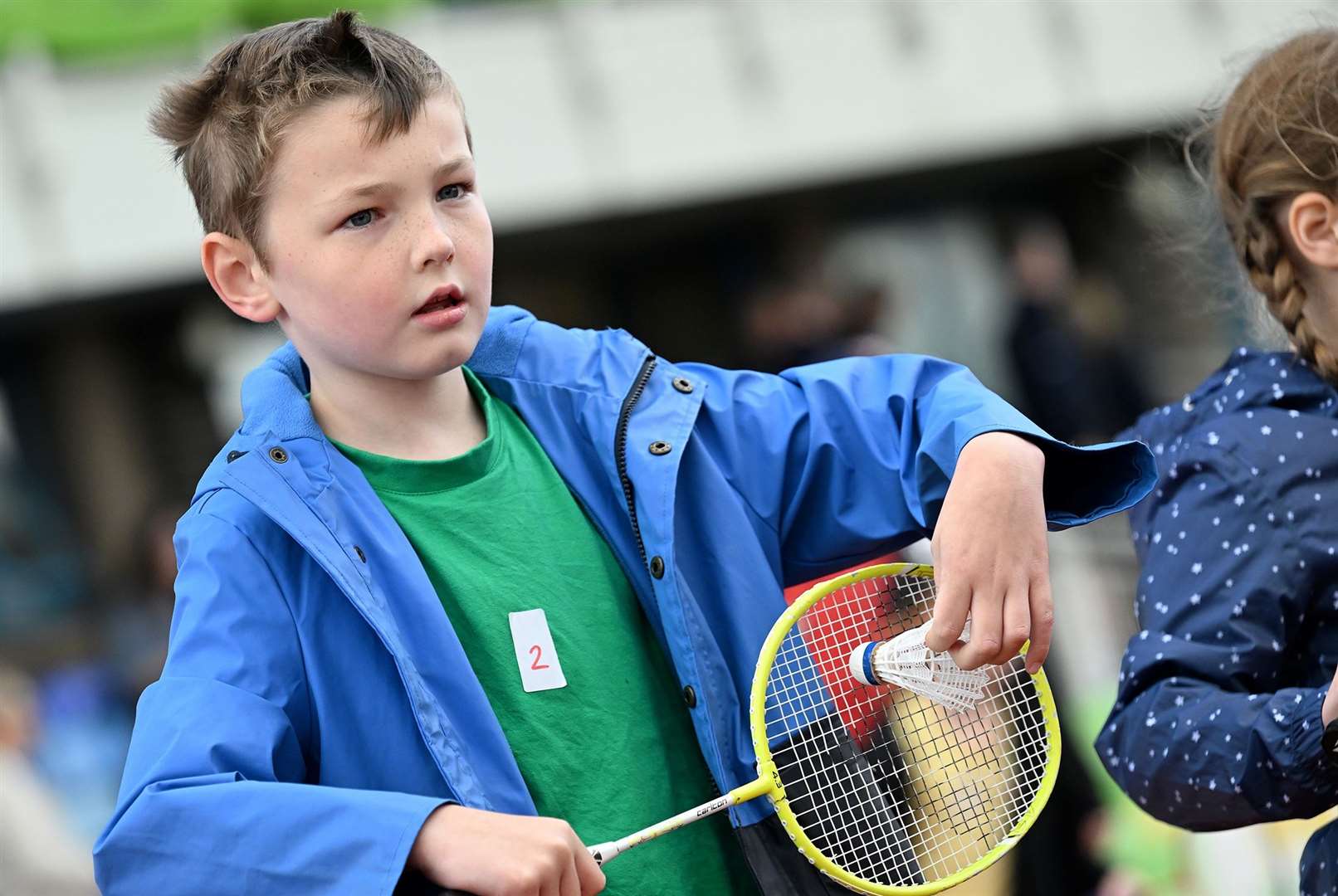 This child has a go at badmington.