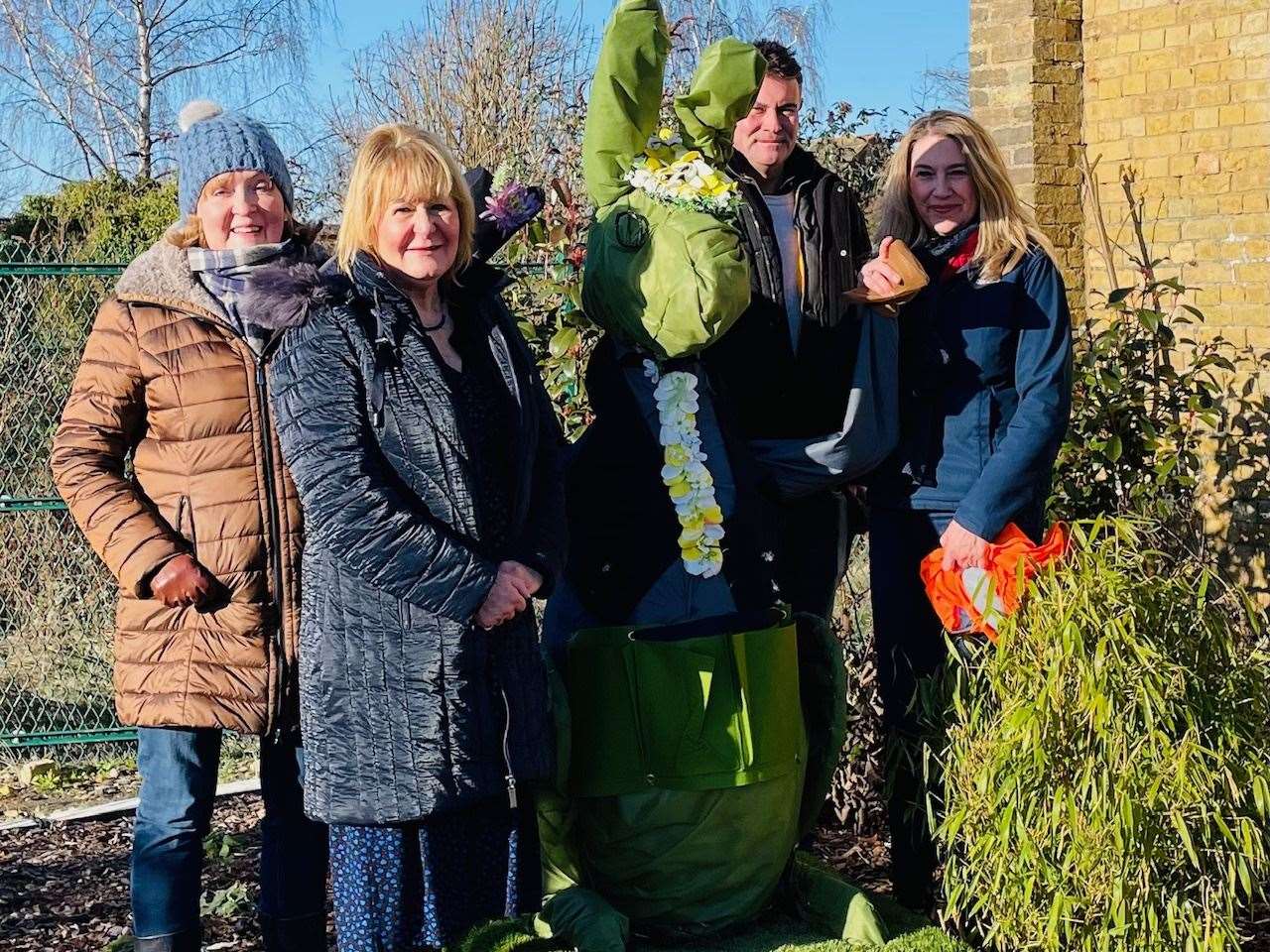 Jan Whitbourn pictured with the rabbit which brightened up Spalding railway station
