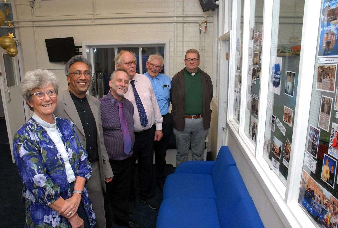 Churches Together in Spalding and District marks its 65th anniversary with a service at The Lighthouse Church, Spalding, where a display celebrating the church's 50th anniversary is viewed by (from left) the Revds David Curran, Robert Sheard, Steve Weatherly-Barton, Pastors Kevin Taylor and Chas Sandhu, as well as the Rev Francis Ballantyne. Photo by Tim Wilson. SG-230619-039T. (13075292)