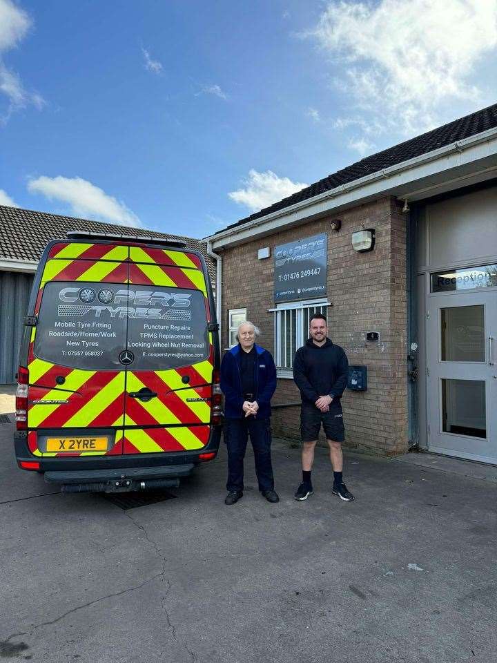 David France and business owner Karl Cooper outside the business. Photo: Supplied