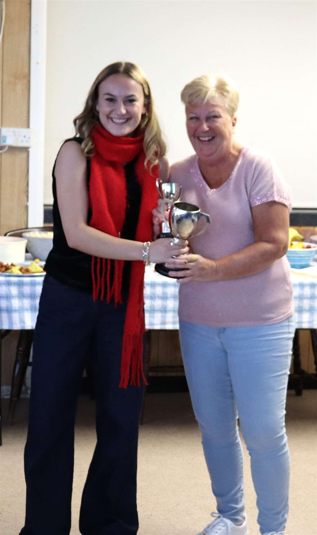 Andy Agar took the spoils in the second Tulip Regatta and Personal Handicap Series. His award was collected by Emma Agar who is pictured with Commodore Sarah Prior.