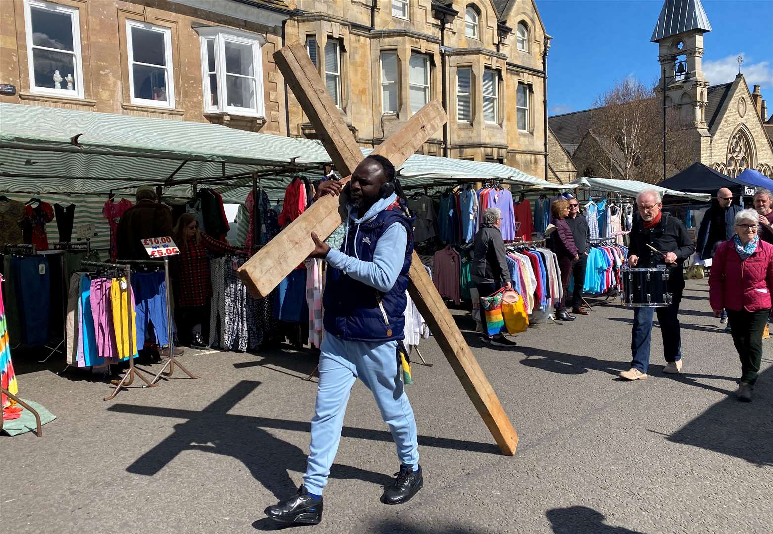 Bob Black carries the cross at the Stamford Walk of Witness