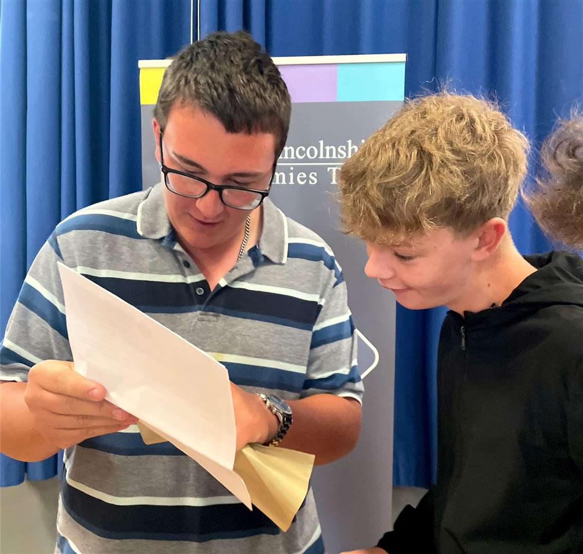 Pupils at Bourne Academy celebrate their GCSE results. Pictured are Oliver Willis and Jack Clayton
