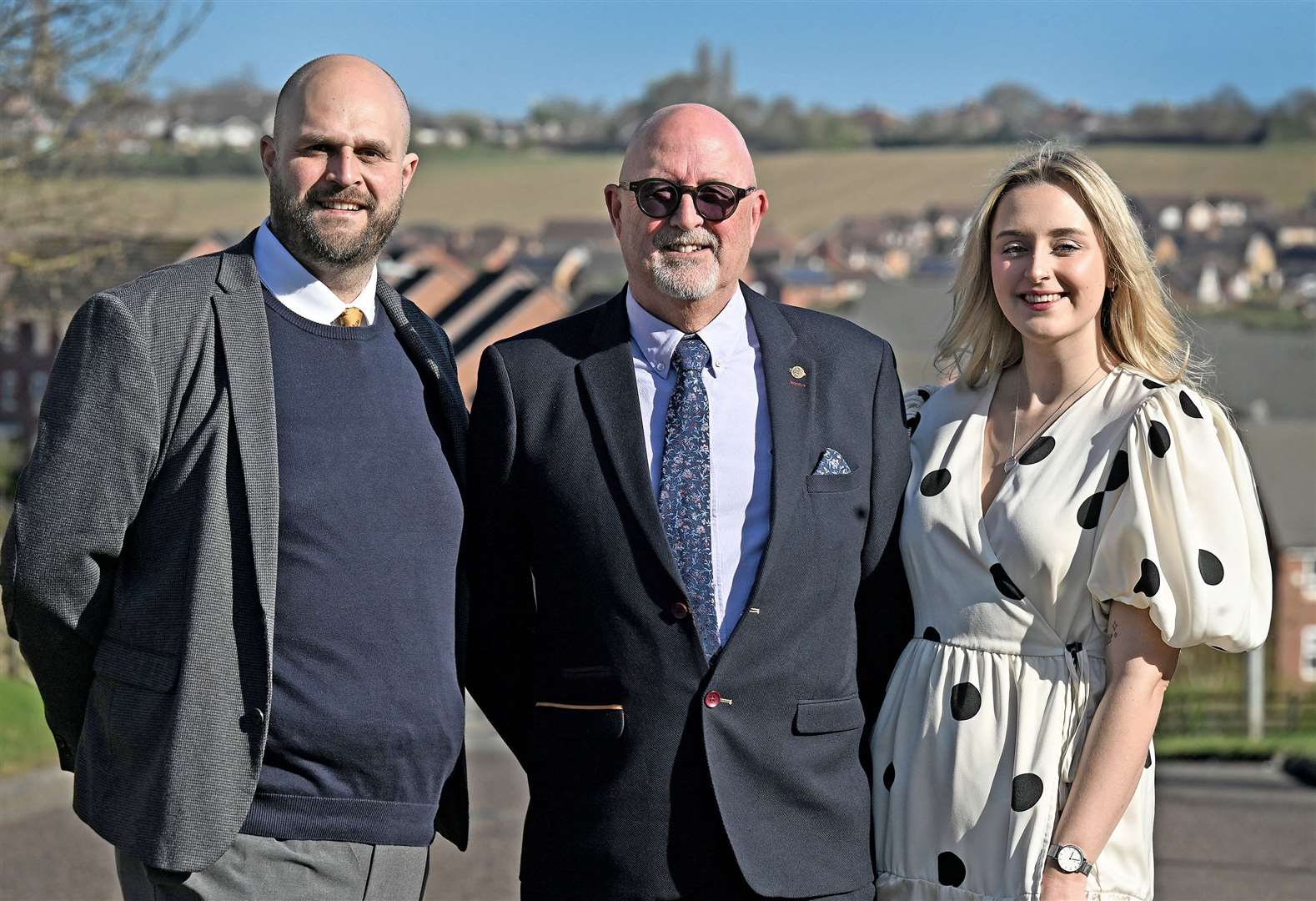 Mark Newton (middle) with his son David (left) and daughter Grace (right)