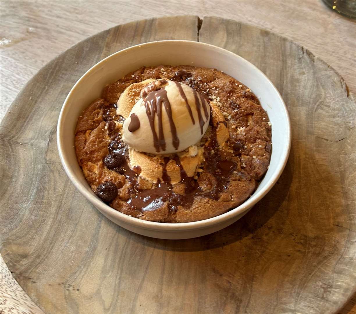 The cookie dough has chocolate sauce, marshmallows and vanilla ice cream