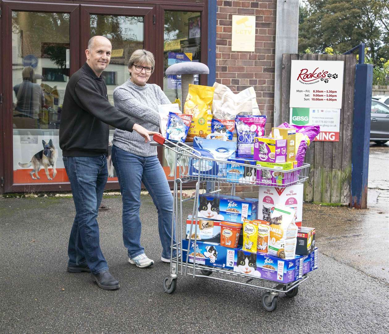 Rooke’s managing director and Yvonne Husband from White Rose Cat Welfare outside Rooke’s Pet Products in Spalding.