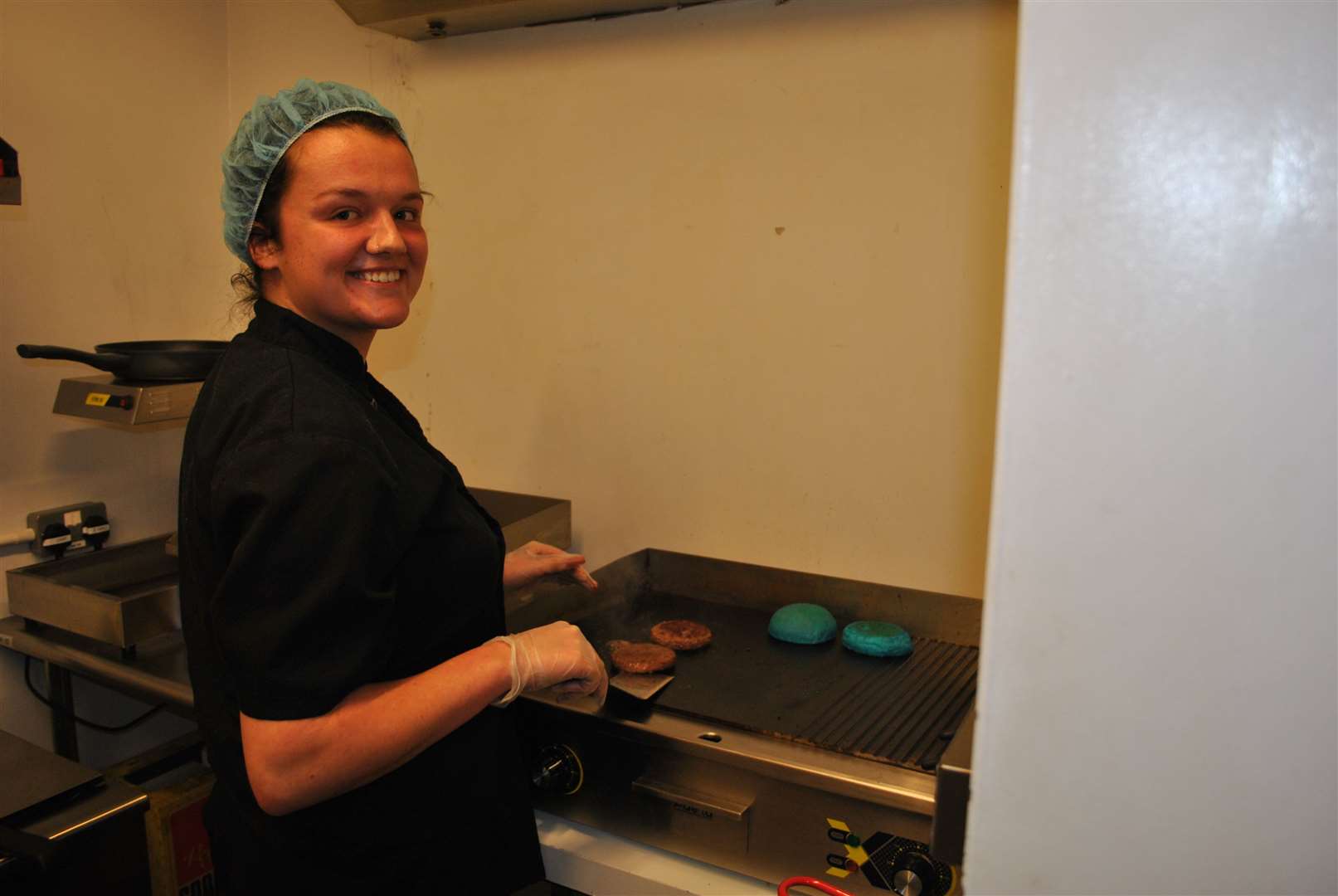 Danielle Green preparing the kangaroo burger. (60399821)