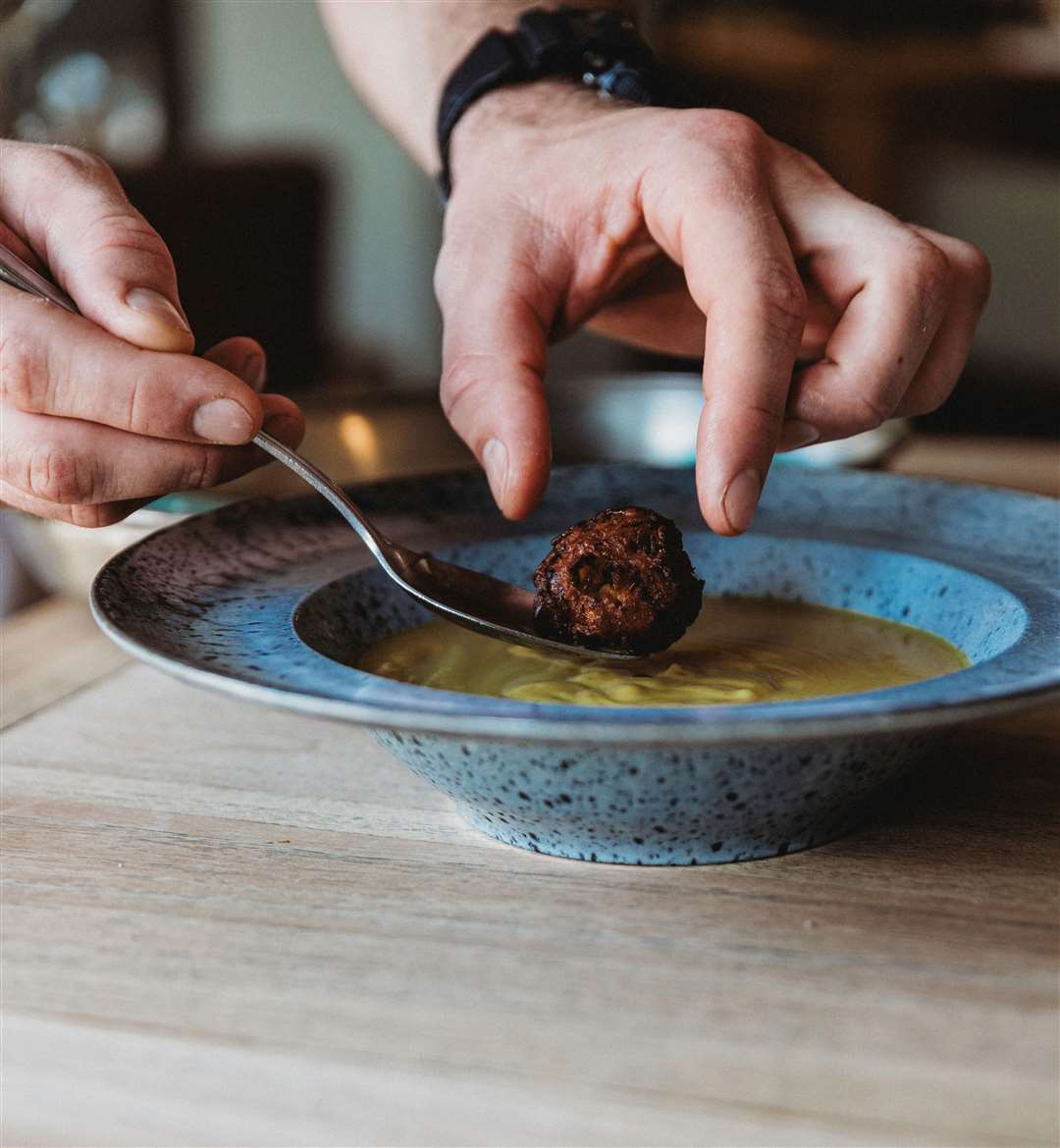 Food being plated at The Finch's Arms