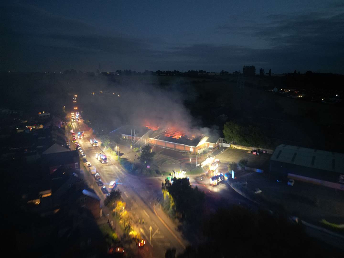 Drone photos show the extent of the fire at the former Aldi store. | Photo: Jake Harris