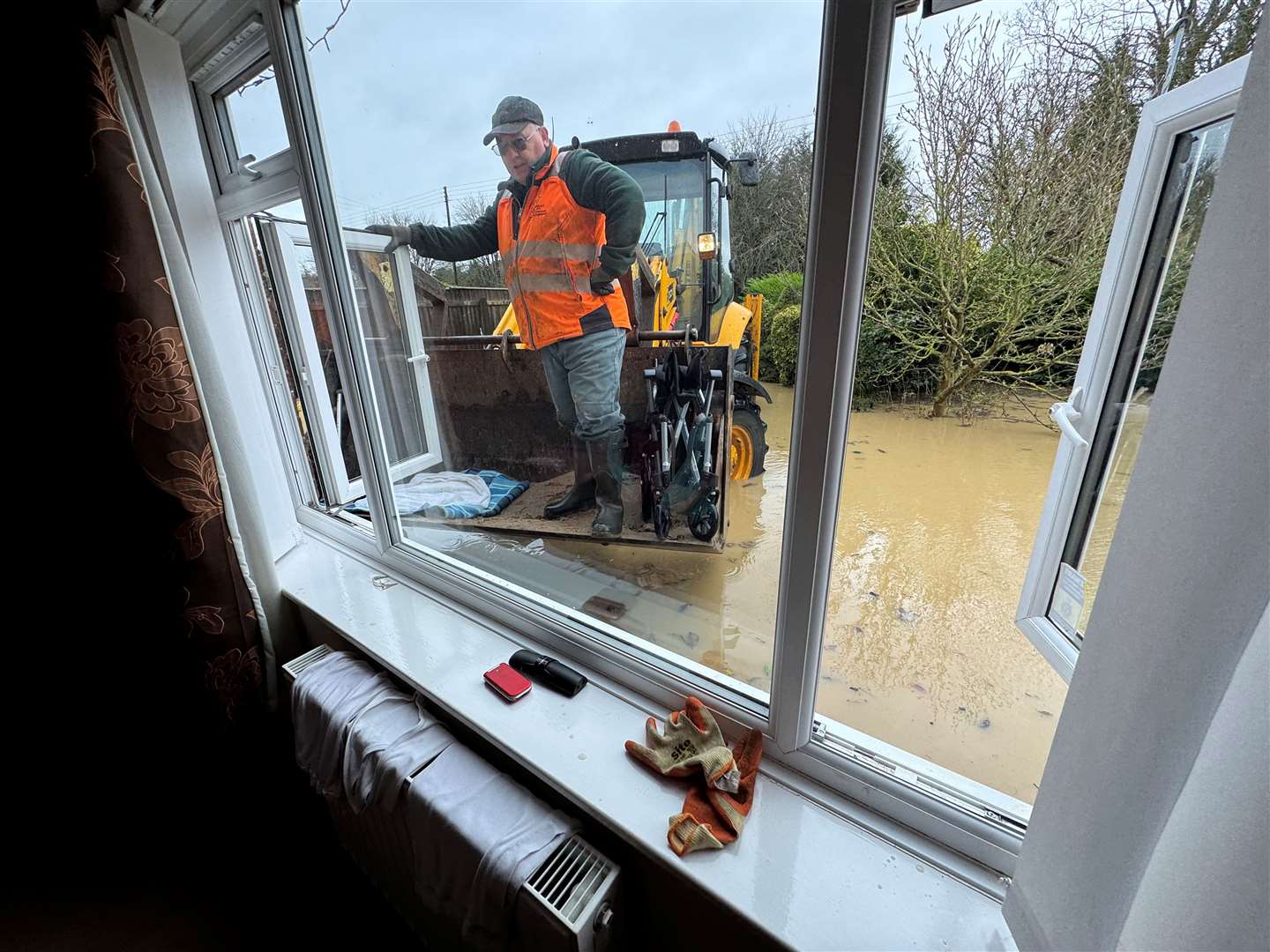 Dean and Ryan rescued stranded home owners through their windows