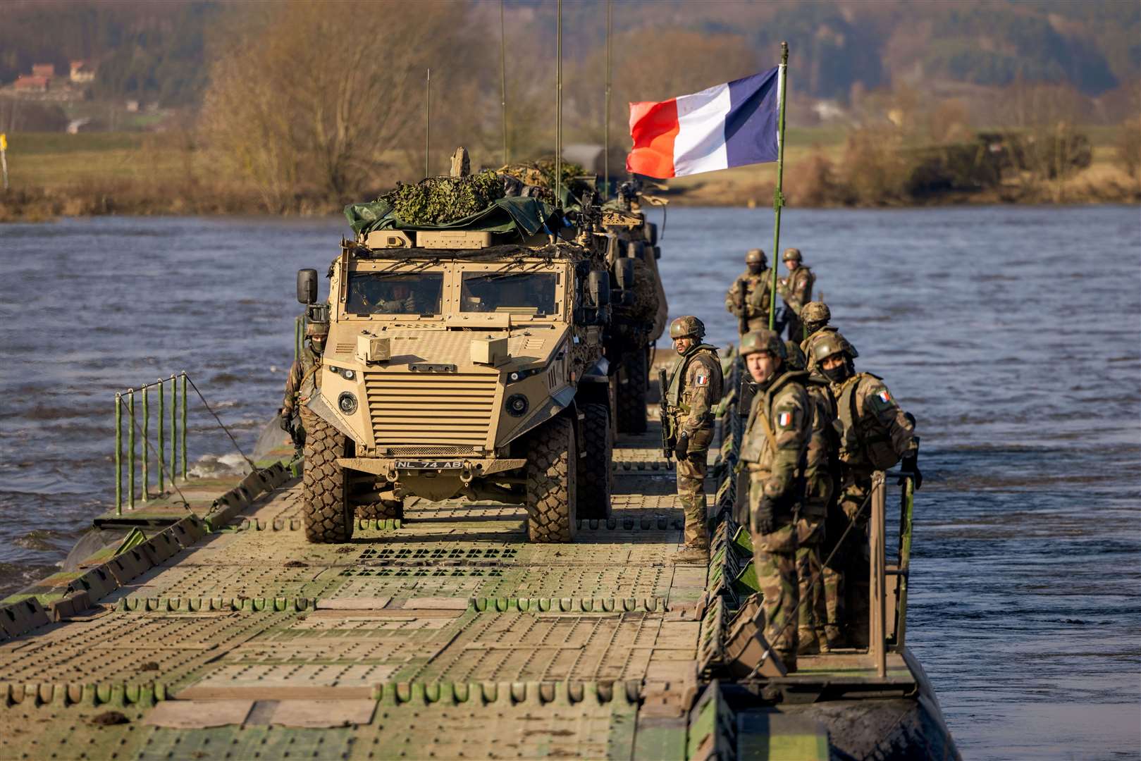 British Foxhounds cross the River Vistula on a river crossing rig in Poland