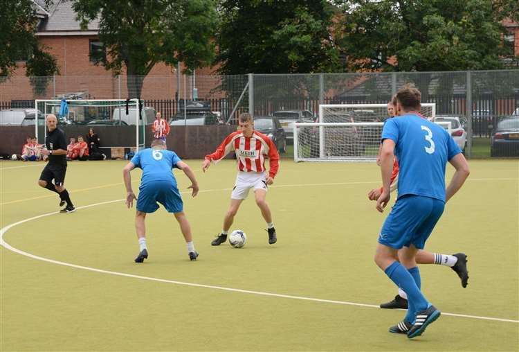Players in a previous year's event raising money for young peoples' wishes.
