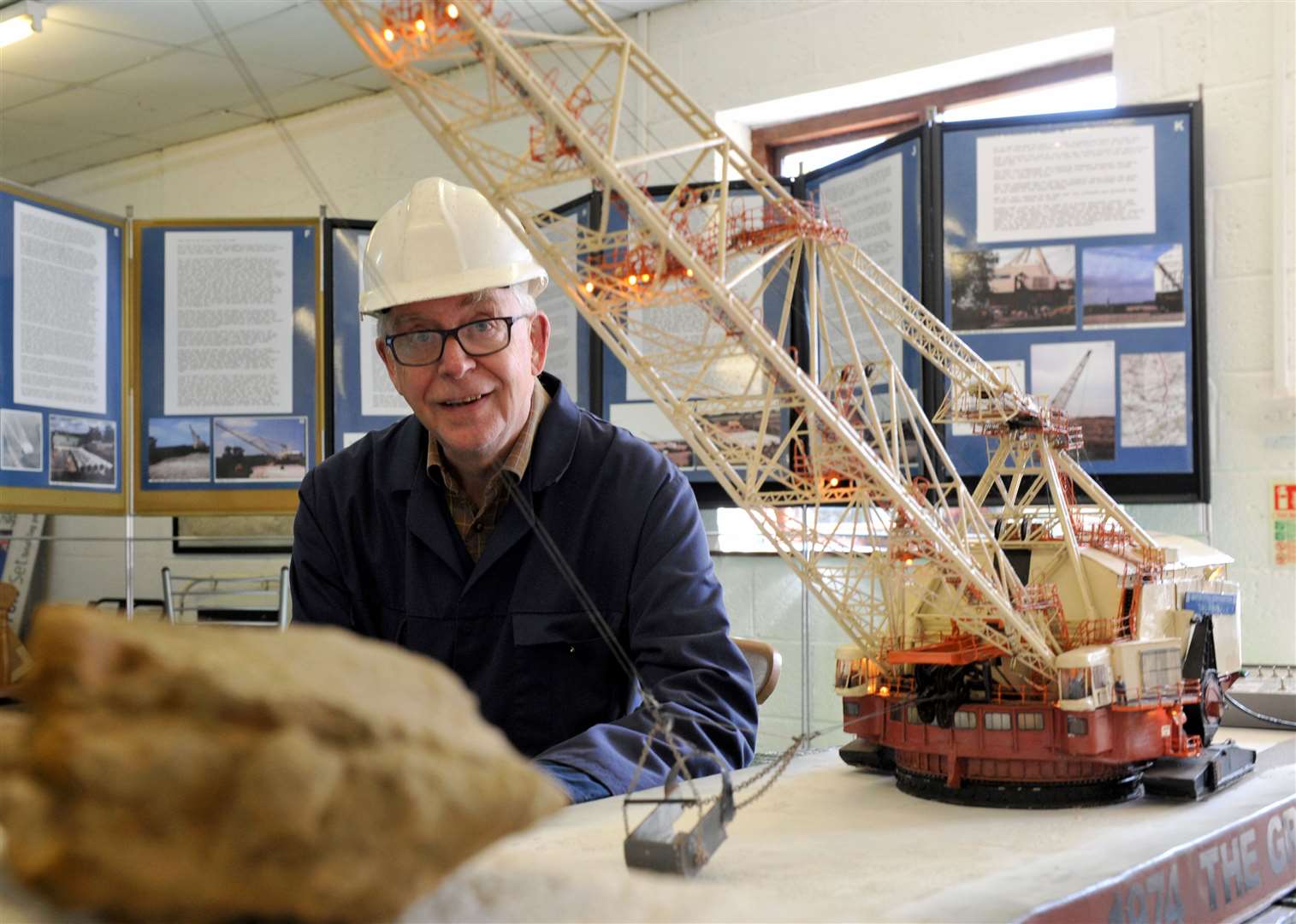 Chairman David Atkinson with a model of the dragline excavator