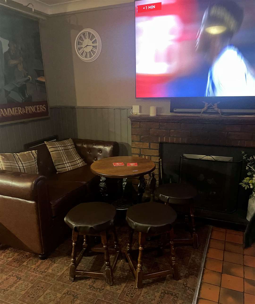 The big screen had the footie on, but nobody was too invested