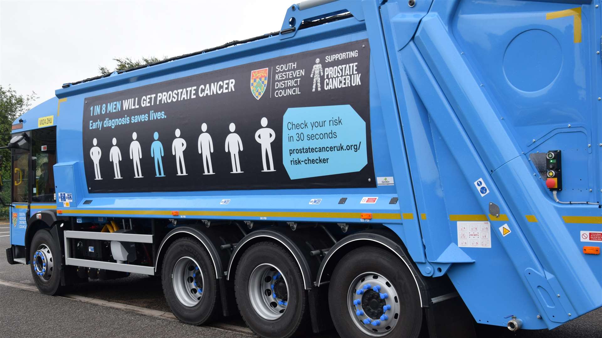 The Prostate Cancer UK message on the side of the bin lorry.
