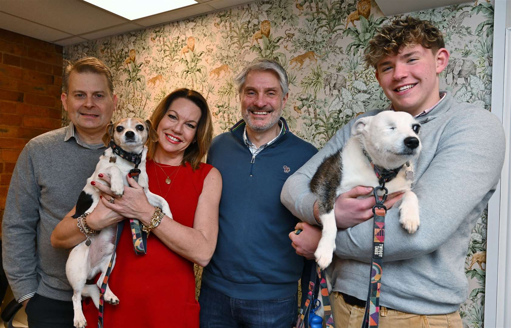 National Grief Advice Service offices opening at Wharf Road, Grantham. Stuart Allcock (uncle) with Emma David and Charlie Webber with dogs Dougie and Maggie