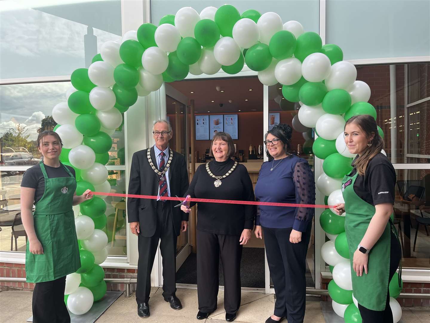 The store was opened with a ribbon cutting (57670488)