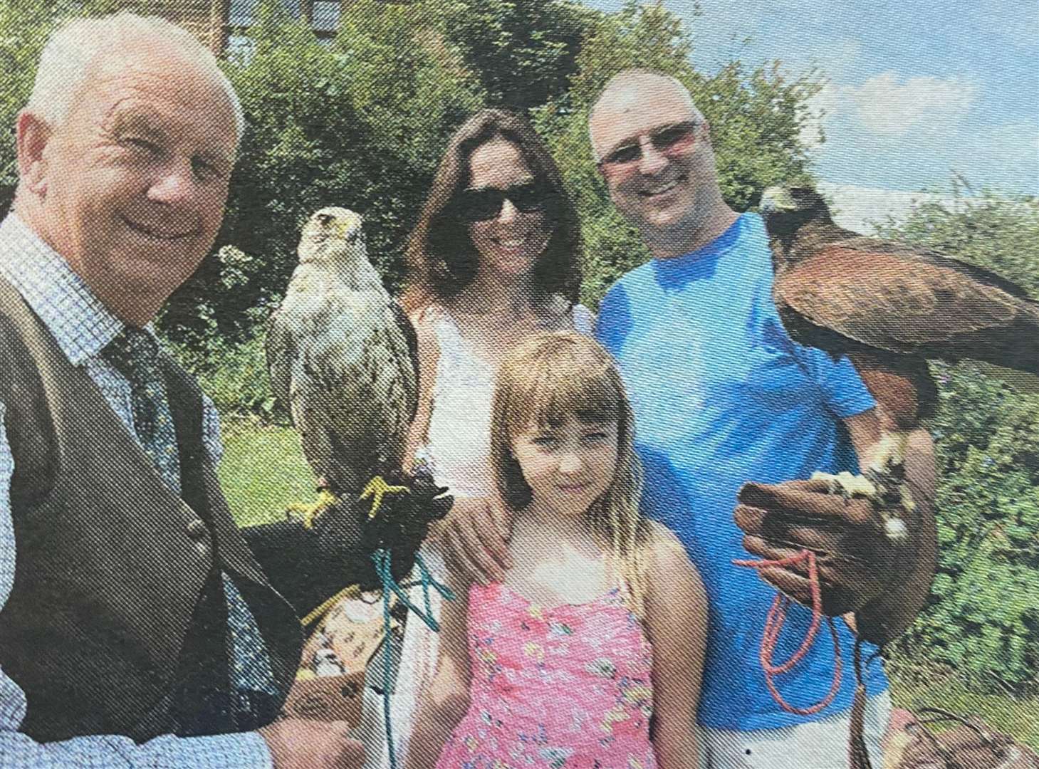 Chris Newal with his Gry Falcon and Harris Hawk with Nicola, Andy and Cora Flinn 10 years ago.