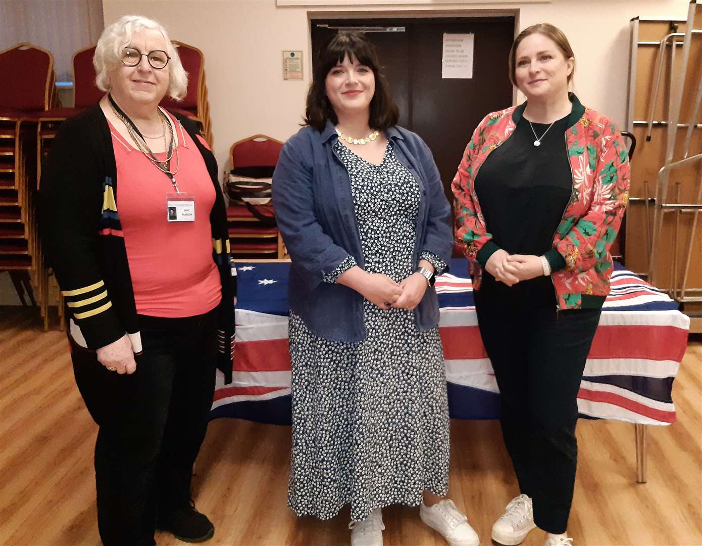 Flinders Return Project committee member Jane Pearson with Susie Flinders-Beatty and Rachel Flinders-Lewis in front of the drape which will be covering the explorer's coffin later this year