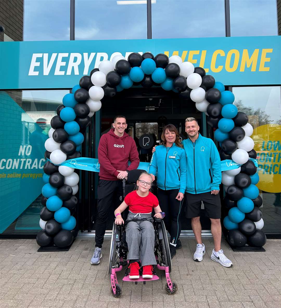 Runner Jason Wright with daughter Olivia, Isla Oliver and Rob Hope at the opening of PureGym Stamford